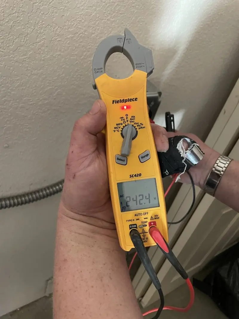 Voltage testing with clamp meter during Generator Installation in Gahanna